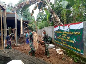 CAPAI 65%, WARGA DAN SATGAS TMMD GENJOT PROGRES PEMBANGUNAN POSYANDU