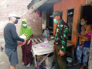 KORAMIL 03/CABANGBUNGIN BAGIKAN SEMBAKO UNTUK WARGA YANG MEMBUTUHKAN