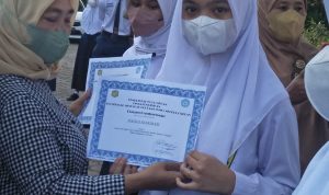 SMPN 7 Medan Bagikan Buku Raport Semester I Dan Gelar Vaksinasi 40 Orang Siswa