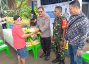 Warga Pineleng Antusias Antri Beras Murah dalam Program Polsek Pineleng dan Bulog SulutGo