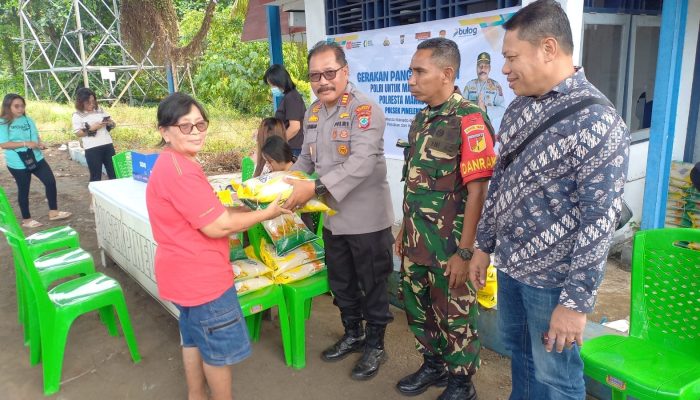 Warga Pineleng Antusias Antri Beras Murah dalam Program Polsek Pineleng dan Bulog SulutGo